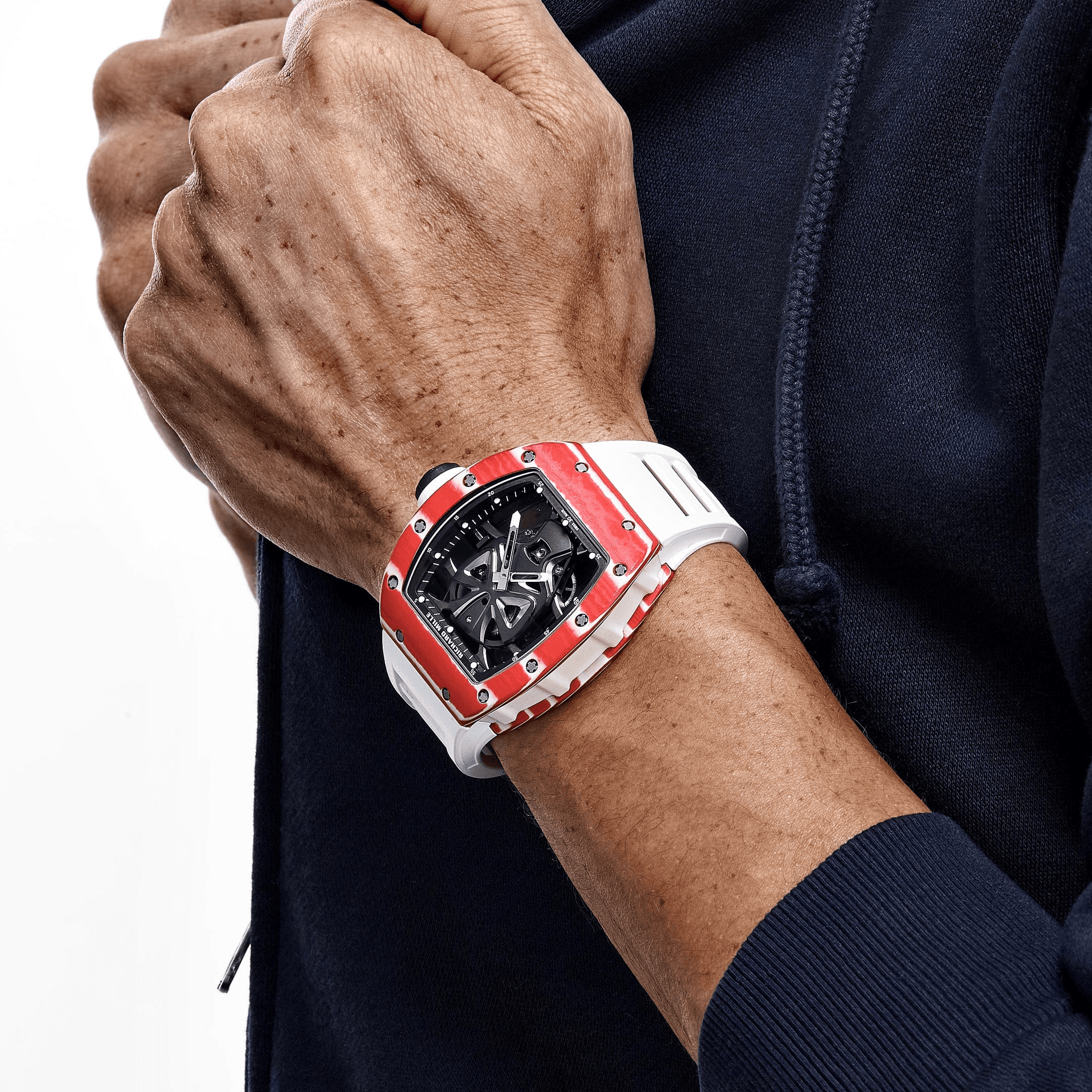 Collector holding a vintage wristwatch
