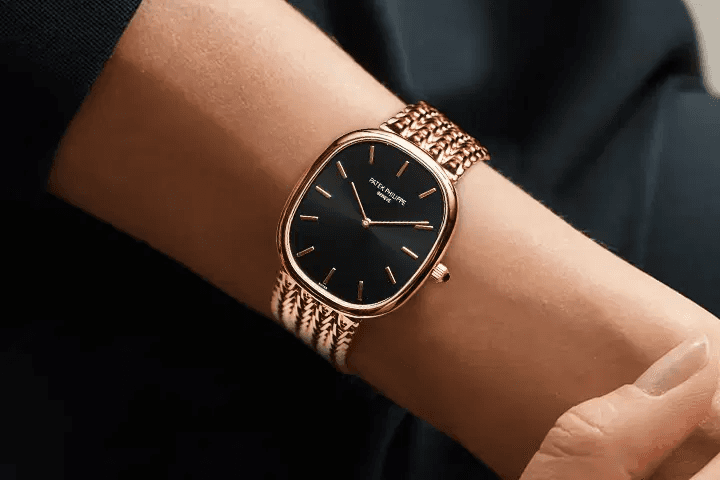 Patek Philippe dress watch on a gold bracelet